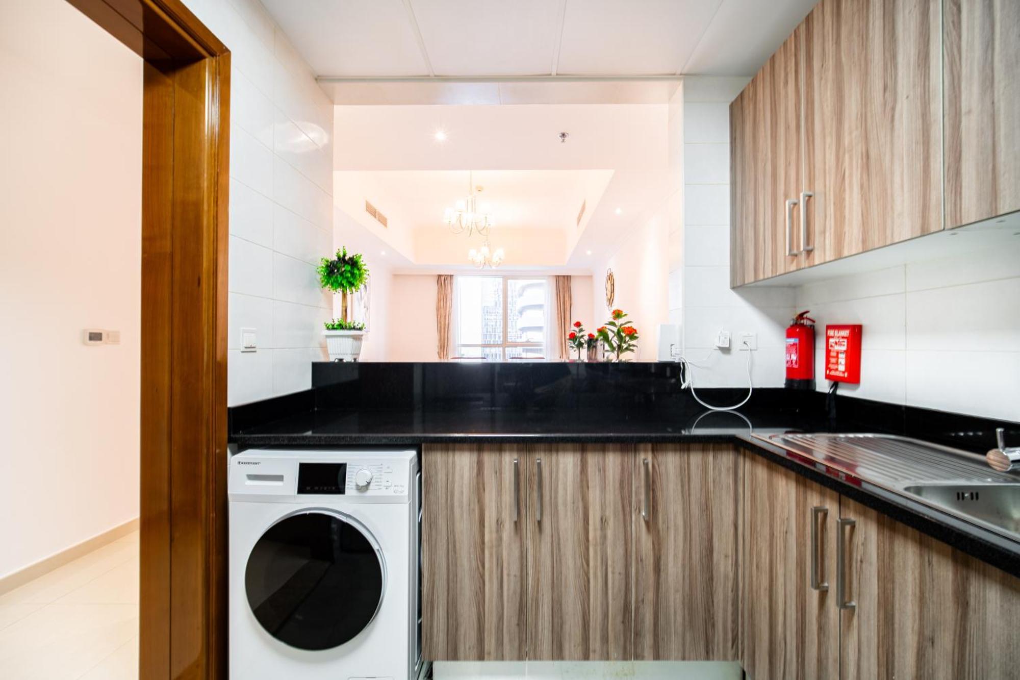 Elegant Escapes - Homely 1b In Dunya Tower Dubai